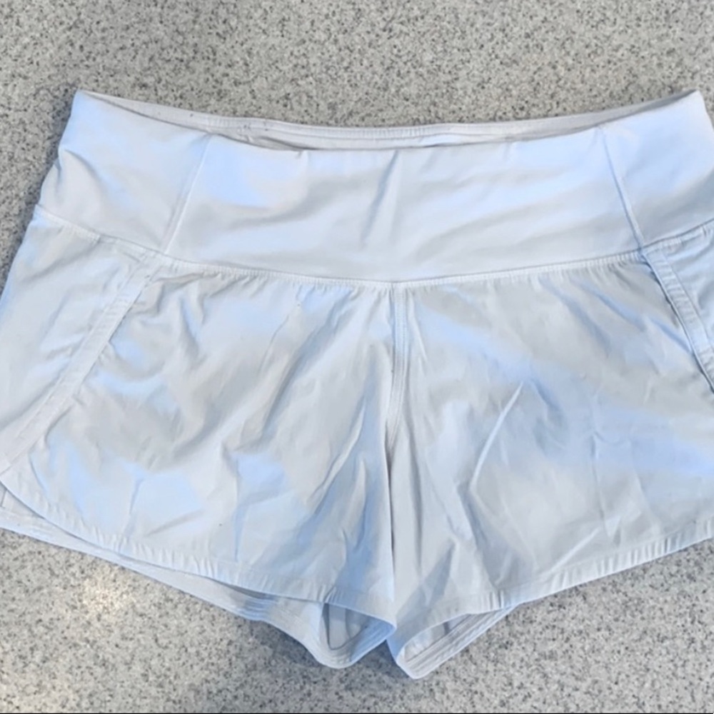 White Lululemon running shorts 4” size 6
